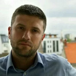 Николай